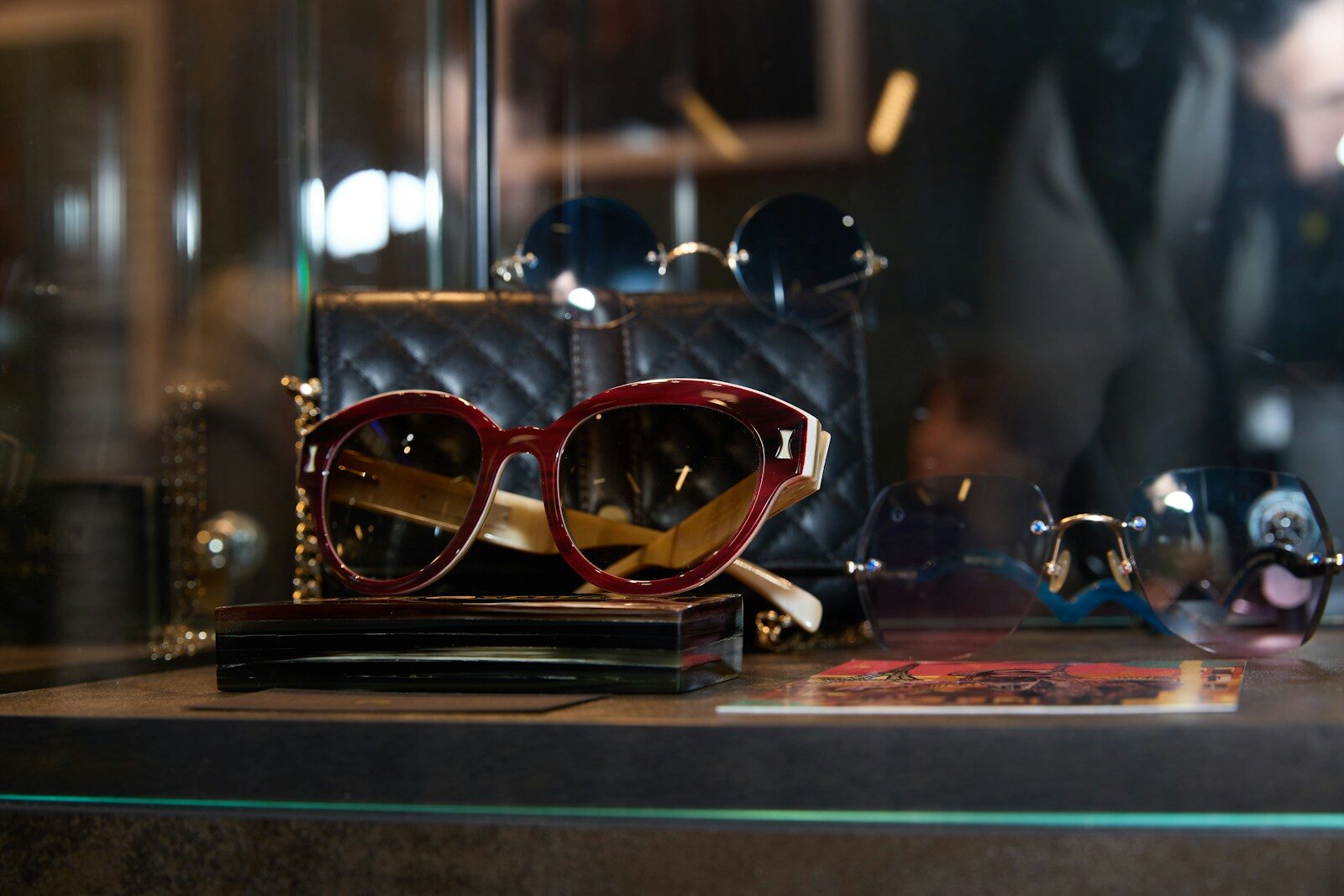 Stylish sunglasses displayed in a shop window.
